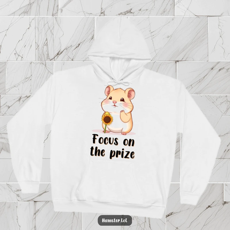 Funny hamster character in a moment of intense concentration, balancing a seed on its nose, depicted on a soft and humorous hoodie.
