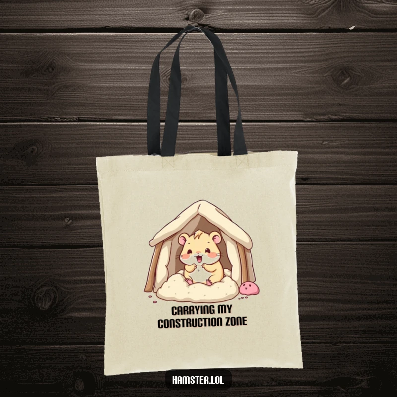 Funny kawaii hamster character building a fort out of bedding, featured on a humorous and practical tote bag.